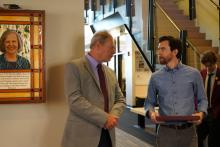 Student and Faculty at reception